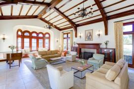 Sun-filled room filled with couches and chairs